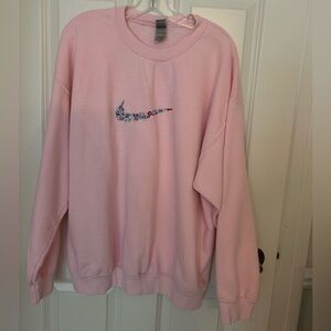 Hand stitched Nike swoosh sweatshirt